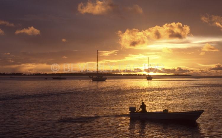 Island Sunsets;sky;sillouettes;sunset;water;red;colorful;yellow;ocean;boats;Majuro: Marshall Island